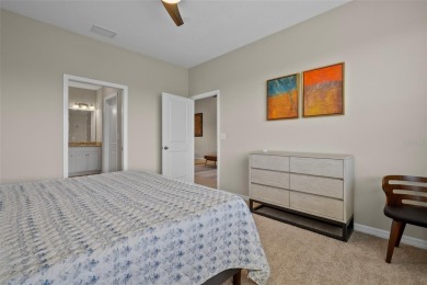 Experience refined living in this elegant second-floor residence on Esplanade Golf and Country at Lakewood Ranch in Florida - for sale on GolfHomes.com, golf home, golf lot