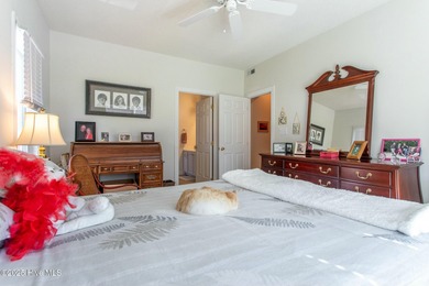 This stylishly renovated 2-bedroom home features a host of on Sound Golf Links at Albemarle Plantation in North Carolina - for sale on GolfHomes.com, golf home, golf lot
