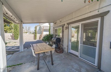 Prepare to be captivated by this charming two-story gem nestled on Rancho Vista Golf Course in California - for sale on GolfHomes.com, golf home, golf lot