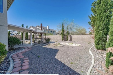 Prepare to be captivated by this charming two-story gem nestled on Rancho Vista Golf Course in California - for sale on GolfHomes.com, golf home, golf lot