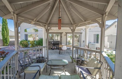 Prepare to be captivated by this charming two-story gem nestled on Rancho Vista Golf Course in California - for sale on GolfHomes.com, golf home, golf lot