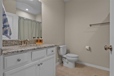 Experience refined living in this elegant second-floor residence on Esplanade Golf and Country at Lakewood Ranch in Florida - for sale on GolfHomes.com, golf home, golf lot