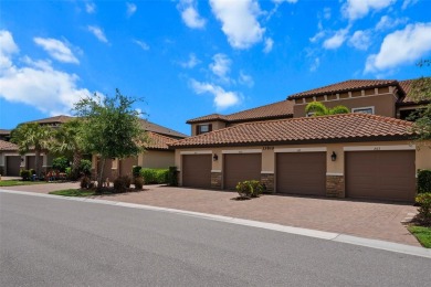 Experience refined living in this elegant second-floor residence on Esplanade Golf and Country at Lakewood Ranch in Florida - for sale on GolfHomes.com, golf home, golf lot