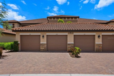 Experience refined living in this elegant second-floor residence on Esplanade Golf and Country at Lakewood Ranch in Florida - for sale on GolfHomes.com, golf home, golf lot
