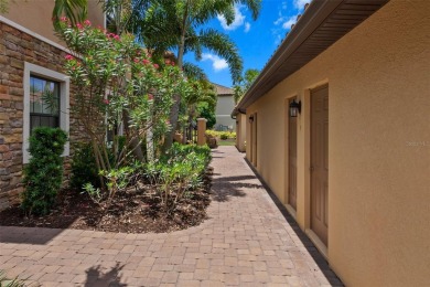 Experience refined living in this elegant second-floor residence on Esplanade Golf and Country at Lakewood Ranch in Florida - for sale on GolfHomes.com, golf home, golf lot