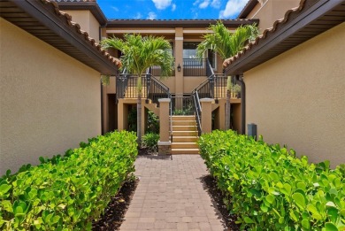 Experience refined living in this elegant second-floor residence on Esplanade Golf and Country at Lakewood Ranch in Florida - for sale on GolfHomes.com, golf home, golf lot