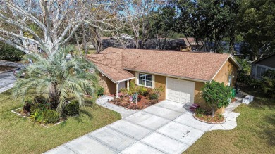 Welcome to this delightful home nestled on a beautifully on Beacon Woods Golf Club in Florida - for sale on GolfHomes.com, golf home, golf lot