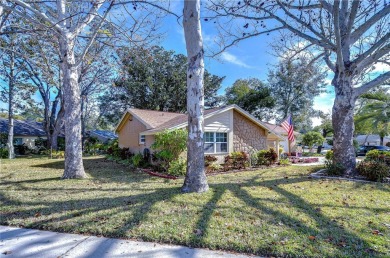 Welcome to this delightful home nestled on a beautifully on Beacon Woods Golf Club in Florida - for sale on GolfHomes.com, golf home, golf lot