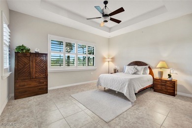 Immaculate lakefront San Remo floor plan home built by WCI on Pelican Preserve Golf Club in Florida - for sale on GolfHomes.com, golf home, golf lot