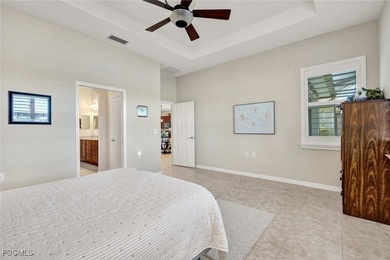 Immaculate lakefront San Remo floor plan home built by WCI on Pelican Preserve Golf Club in Florida - for sale on GolfHomes.com, golf home, golf lot