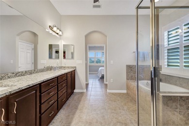 Immaculate lakefront San Remo floor plan home built by WCI on Pelican Preserve Golf Club in Florida - for sale on GolfHomes.com, golf home, golf lot