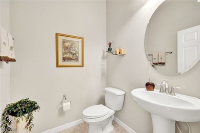 Immaculate lakefront San Remo floor plan home built by WCI on Pelican Preserve Golf Club in Florida - for sale on GolfHomes.com, golf home, golf lot