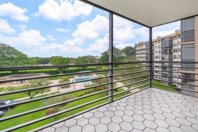 Spacious, open designed 2 bedroom, 2 bath corner unit in the 55+ on Pembroke Lakes Golf Club in Florida - for sale on GolfHomes.com, golf home, golf lot