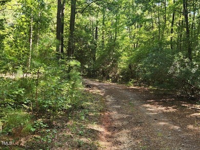 Check out this rare opportunity to own 1.7 acres in Lake Royale on River Golf and Country Club at Lake Royale in North Carolina - for sale on GolfHomes.com, golf home, golf lot