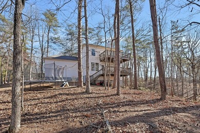 Nestled along the peaceful shores of Lake Arrowhead with on The Highlands Course at Lake Arrowhead in Georgia - for sale on GolfHomes.com, golf home, golf lot