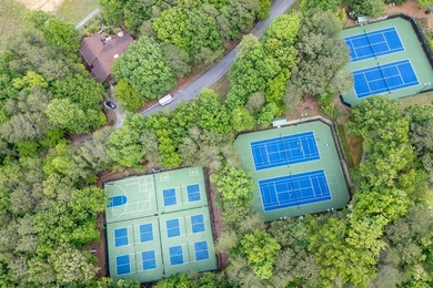 Nestled along the peaceful shores of Lake Arrowhead with on The Highlands Course at Lake Arrowhead in Georgia - for sale on GolfHomes.com, golf home, golf lot