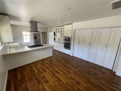 Modern luxury and masterful design and are uniquely embodied in on El Caballero Country Club in California - for sale on GolfHomes.com, golf home, golf lot