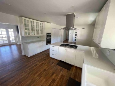 Modern luxury and masterful design and are uniquely embodied in on El Caballero Country Club in California - for sale on GolfHomes.com, golf home, golf lot