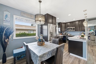 Absolutely stunning, fully updated ground-floor corner villa on Kings Point Golf -Flanders Way in Florida - for sale on GolfHomes.com, golf home, golf lot