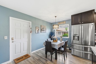 Absolutely stunning, fully updated ground-floor corner villa on Kings Point Golf -Flanders Way in Florida - for sale on GolfHomes.com, golf home, golf lot