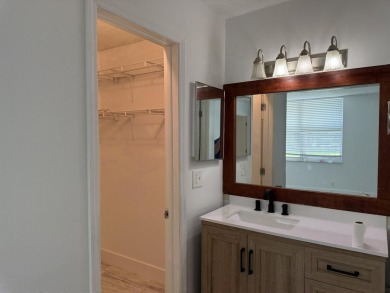 This well-maintained first-floor unit offers a great combination on Pine Island Ridge Country Club in Florida - for sale on GolfHomes.com, golf home, golf lot