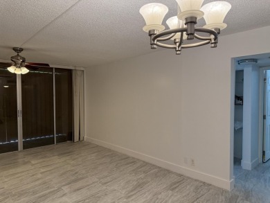 This well-maintained first-floor unit offers a great combination on Pine Island Ridge Country Club in Florida - for sale on GolfHomes.com, golf home, golf lot