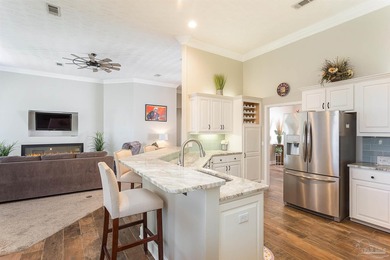 Beautifully renovated 4 bedroom, 3 full bath home on the 13th on Tiger Point Golf and Country Club in Florida - for sale on GolfHomes.com, golf home, golf lot