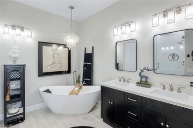 Welcome to elevated living in The Quarry of Naples. This on The Golf Lodge At the Quarry in Florida - for sale on GolfHomes.com, golf home, golf lot