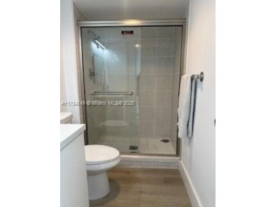 BEAUTIFULLY REMODELED 2 BEDROOM, 2 BATHROOM UNIT IN DESIRABLE on Turnberry Isle Resort and Club in Florida - for sale on GolfHomes.com, golf home, golf lot