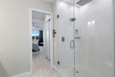 Welcome to elevated living in The Quarry of Naples. This on The Golf Lodge At the Quarry in Florida - for sale on GolfHomes.com, golf home, golf lot