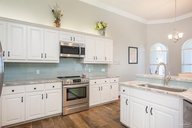 Beautifully renovated 4 bedroom, 3 full bath home on the 13th on Tiger Point Golf and Country Club in Florida - for sale on GolfHomes.com, golf home, golf lot