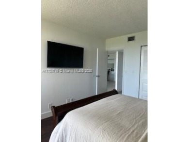 BEAUTIFULLY REMODELED 2 BEDROOM, 2 BATHROOM UNIT IN DESIRABLE on Turnberry Isle Resort and Club in Florida - for sale on GolfHomes.com, golf home, golf lot