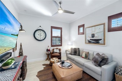 Welcome to elevated living in The Quarry of Naples. This on The Golf Lodge At the Quarry in Florida - for sale on GolfHomes.com, golf home, golf lot