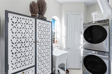 Welcome to elevated living in The Quarry of Naples. This on The Golf Lodge At the Quarry in Florida - for sale on GolfHomes.com, golf home, golf lot