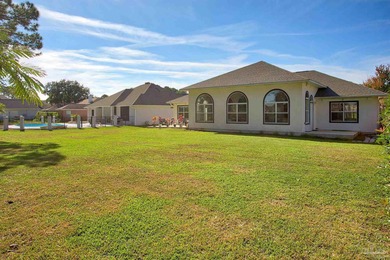 Beautifully renovated 4 bedroom, 3 full bath home on the 13th on Tiger Point Golf and Country Club in Florida - for sale on GolfHomes.com, golf home, golf lot