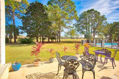 Beautifully renovated 4 bedroom, 3 full bath home on the 13th on Tiger Point Golf and Country Club in Florida - for sale on GolfHomes.com, golf home, golf lot