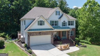 This custom-built home sits on a roundabout cul-de-sac nestled on Hampton Golf Village in Georgia - for sale on GolfHomes.com, golf home, golf lot