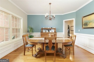 This custom-built home sits on a roundabout cul-de-sac nestled on Hampton Golf Village in Georgia - for sale on GolfHomes.com, golf home, golf lot