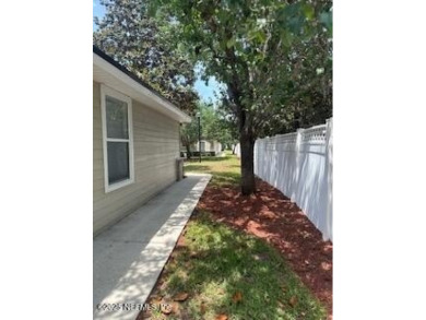 Highly sought after one-story end unit on preserve in gated on Julington Creek Golf Club in Florida - for sale on GolfHomes.com, golf home, golf lot