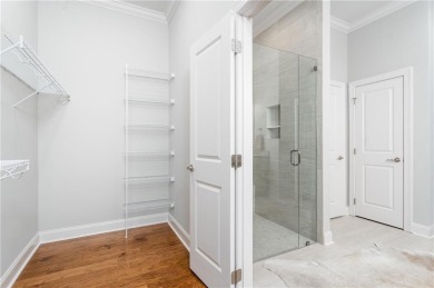 Experience the epitome of luxurious, age-targeted living at on Grand National Golf Course in Alabama - for sale on GolfHomes.com, golf home, golf lot
