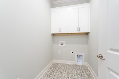 Experience the epitome of luxurious, age-targeted living at on Grand National Golf Course in Alabama - for sale on GolfHomes.com, golf home, golf lot