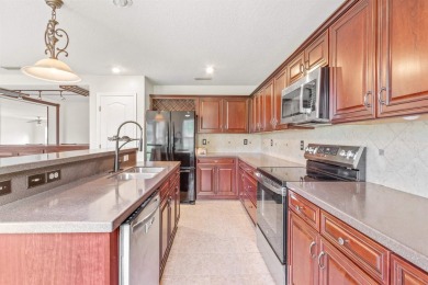 Nestled On A Corner Lot In A Peaceful Cul De Sac Within The Golf on St. Johns Golf Club in Florida - for sale on GolfHomes.com, golf home, golf lot