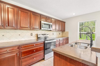 Nestled On A Corner Lot In A Peaceful Cul De Sac Within The Golf on St. Johns Golf Club in Florida - for sale on GolfHomes.com, golf home, golf lot