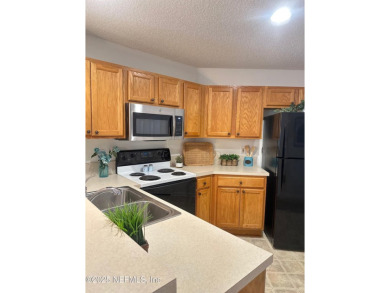Highly sought after one-story end unit on preserve in gated on Julington Creek Golf Club in Florida - for sale on GolfHomes.com, golf home, golf lot