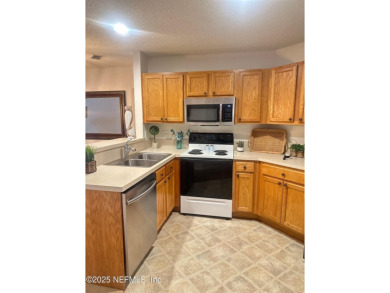 Highly sought after one-story end unit on preserve in gated on Julington Creek Golf Club in Florida - for sale on GolfHomes.com, golf home, golf lot
