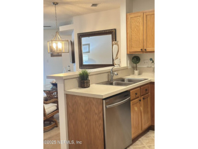 Highly sought after one-story end unit on preserve in gated on Julington Creek Golf Club in Florida - for sale on GolfHomes.com, golf home, golf lot