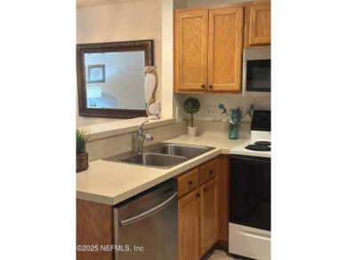 Highly sought after one-story end unit on preserve in gated on Julington Creek Golf Club in Florida - for sale on GolfHomes.com, golf home, golf lot