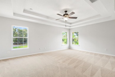 Nestled On A Corner Lot In A Peaceful Cul De Sac Within The Golf on St. Johns Golf Club in Florida - for sale on GolfHomes.com, golf home, golf lot