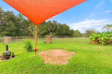 Nestled On A Corner Lot In A Peaceful Cul De Sac Within The Golf on St. Johns Golf Club in Florida - for sale on GolfHomes.com, golf home, golf lot