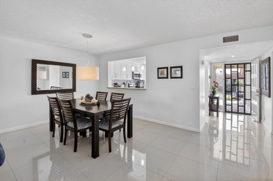 This tastefully updated condo is move-in ready and has been on Indian Spring Golf and Country Club in Florida - for sale on GolfHomes.com, golf home, golf lot